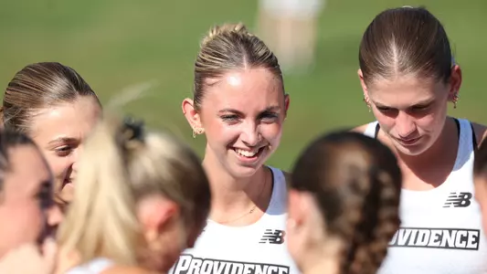 Annie Mann warming up at Friar Invitational 
