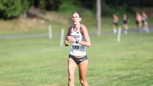 Kate Currie racing at Friar Invitational 