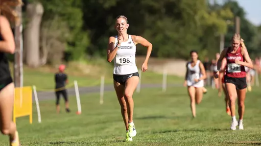 Annie Mann racing at Friar invitational 