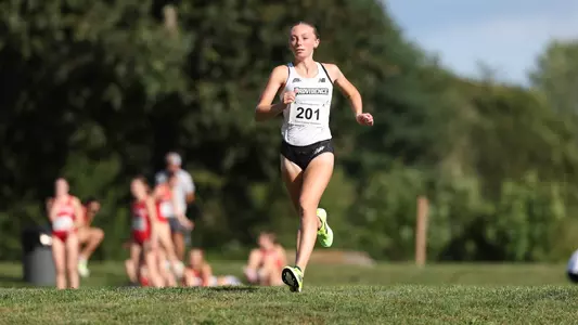 Emilia O'Leary Warming Up before Friar Invitational