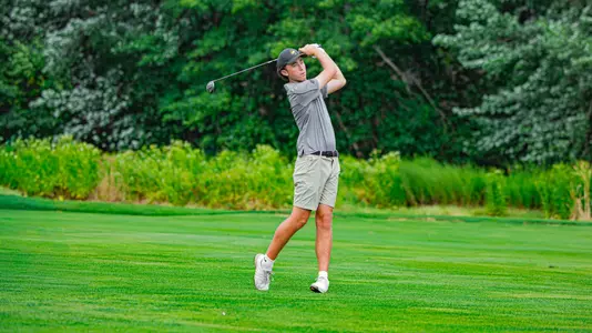 Men's Golfer Maurice Hoben III driving the ball