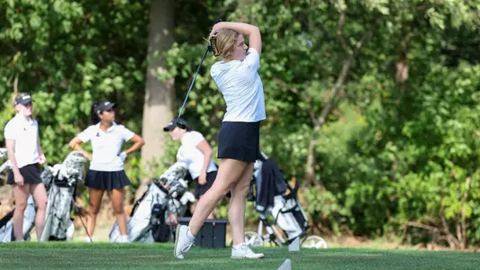 Women's golf player Annabel Widdifield hitting a tee shot