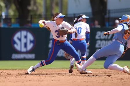 Kenleigh Cahalan fields a ball against Tennessee