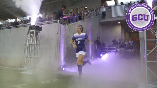 Mikaela McGee runs onto the field for her GCU home debut.