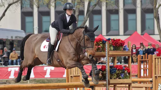 Ana Bertozzi rides in the fences