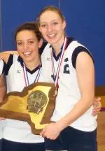 Sharp, right, helped Victor High School to the New York State Championship.