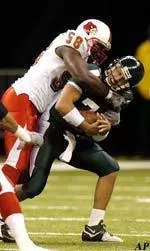 Defensive end Elvis Dumervil sacks Tulane quarterback Richard Irvin.