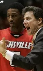 Louisville coach Rick Pitino shouts instructions during the Cards' win at Cincinnati.