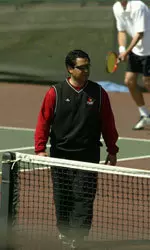 Men's tennis coach Rex Ecarma