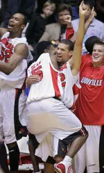 Louisville celebrates their win over West Virginia.