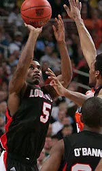 Taquan Dean shoots over an Illini defender in Saturday's Final Four national semifinal.