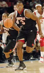 Juan Palacios leads the fast break against St. John's in the first half.