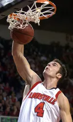 David Padgett dunks during first half action against UC Davis. (AP Photo)
