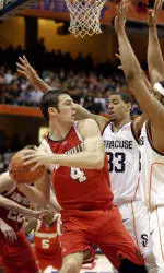 David Padgett is pressured by Syracuse during the first half.