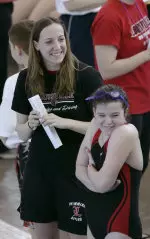 U of L swimmers and divers volunteered to help run the meet.