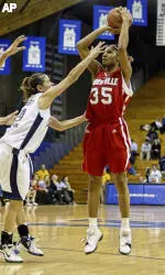 Louisville's Angel McCoughtry shoots as Villanova's Kyle Dougherty defends in the second half. (AP Photo/H. Rumph Jr)