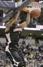 Terrence Williams dunks the ball against Pittsburgh. (AP Photo/Keith Srakocic)