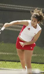 Baez won at both singles and doubles.