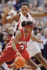 Patrika Barlow tries to get around Connecticut's Charde Houston during her teams 76-50 semifinal loss to Connecticut. (AP Photo/Fred Beckham)