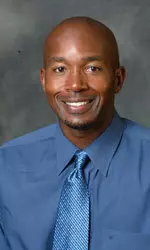 Mark Beckham was named head coach of women's tennis.