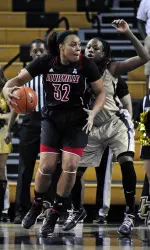 Louisville Cardinals forward Emmonnie Henderson (32) is defended by UCF Knights forward/center Erika Jones (55). (David Manning-USA TODAY Sports)