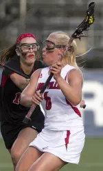 Kaylin Morissette tied the tournament's record for goals in a game (70) and broke the record for draw controls (12).