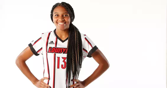 Brooklynn Rivers smiles for the camera at a team photo shoot