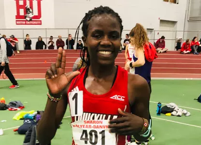 Dorcas Wasike celebrates her school record performance at the BU Season Opener