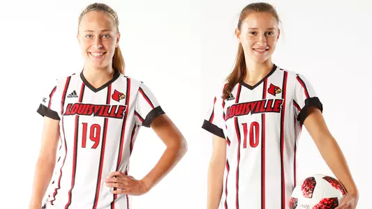 Emina Ekic and Maisie Whitsett pose for a photo during a team photo shoot