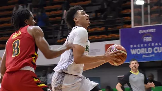 Jordan Nwora makes a move to the basket for Nigeria in an African Qualifier game in Lagos, Nigeria.