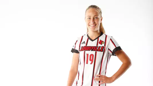 Women's soccer freshman Maisie Whitsett poses for a picture during photo day.