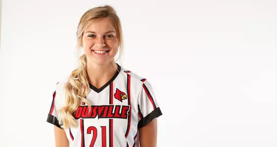 Morgan Everett smiles for the camera during the team photo day