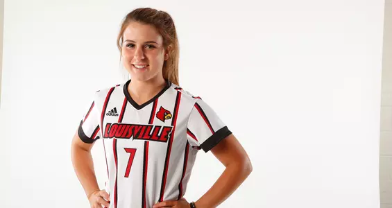 Women's soccer junior Sanela Hodzic smile for a photo during the team's picture day. 