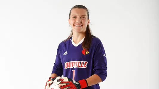 Gabby Kouzelos poses for the camera at the team's photo shoot