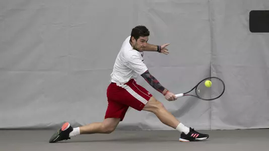 Federico Gomez returns the ball during the match against Purdue at the Bass-Rudd Tennis Center on February 17