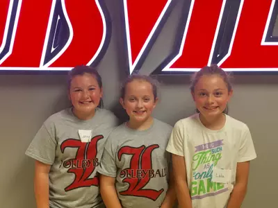 Volleyball Campers pose for a picture 
