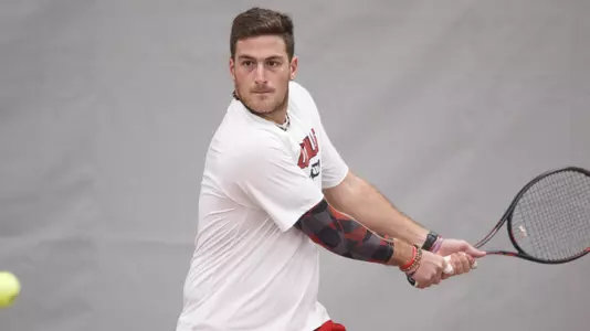 Federico Gomez returns the ball during the Home Opener against Lipscomb at the Bass-Rudd Tennis Center, January 18, 2019.