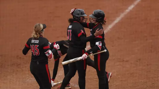 Rebecca Chung celebrates after a home run against Missouri