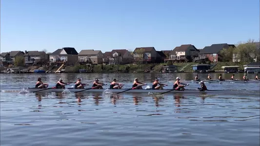 The Louisville 2V8+ crew competes against Michigan and Michigan State at Bellevue Lake.