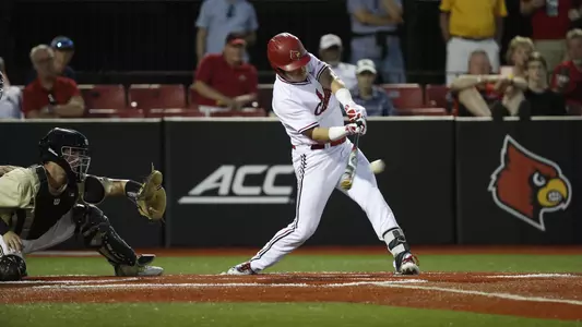 Danny Oriente swings against Vanderbilt at Jim Patterson Stadium.