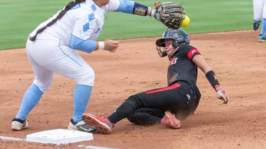 Maddy Newman slides into third base against North Carolina