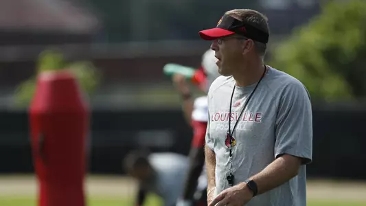 Scott Satterfield yells instructions to his team