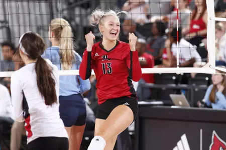 Amber Stivrins celebrates at the net 