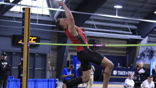 Micah Oberhausen crosses the bar in the high jump