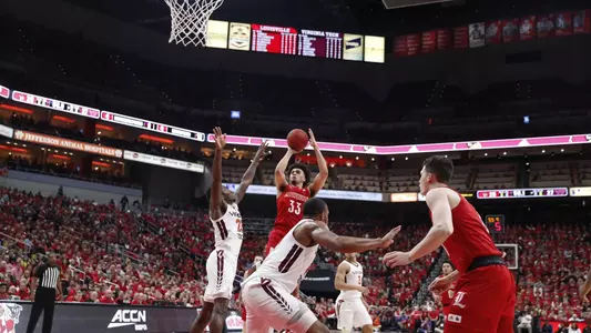 Jordan Nwora takes a shot against Virginia Tech