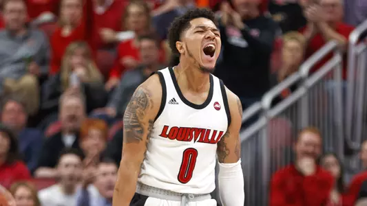 Lamarr "Fresh" Kimble celebrates a play against Syracuse.