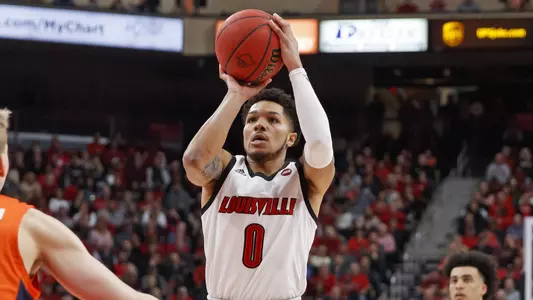 Lamarr "Fresh" Kimble puts up a shot against Syracuse.