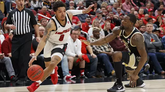 Lamarr "Fresh" Kimble drives against Wake Forest.