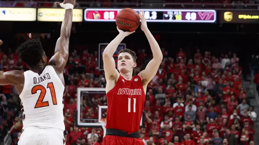 Quinn Slazinski shoots agains Virginia Tech in the KFC Yum! Center.