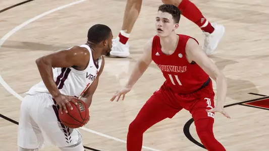 Quinn Slazinski defends against Virginia Tech on March 1.